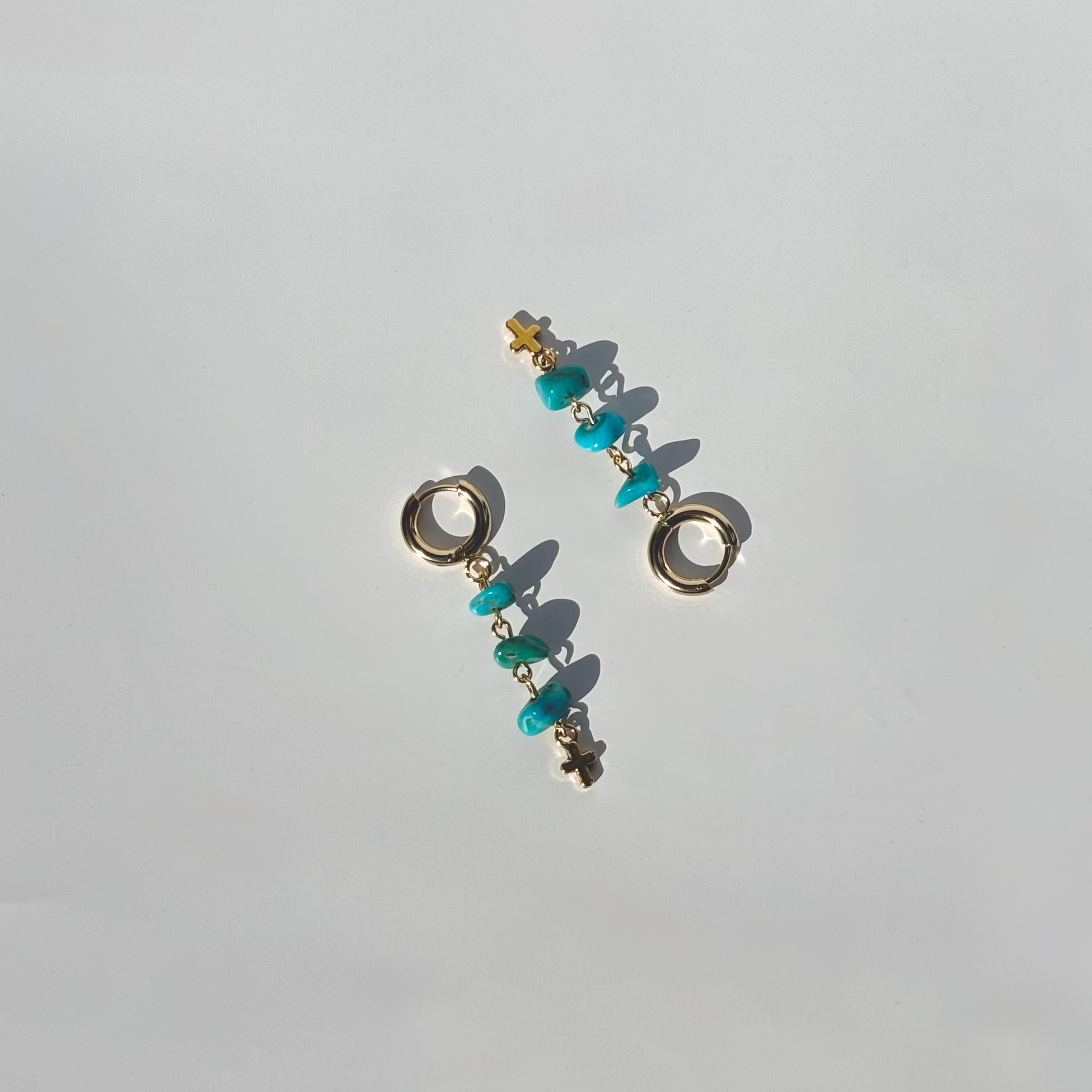 Turquoise Cross Clickers