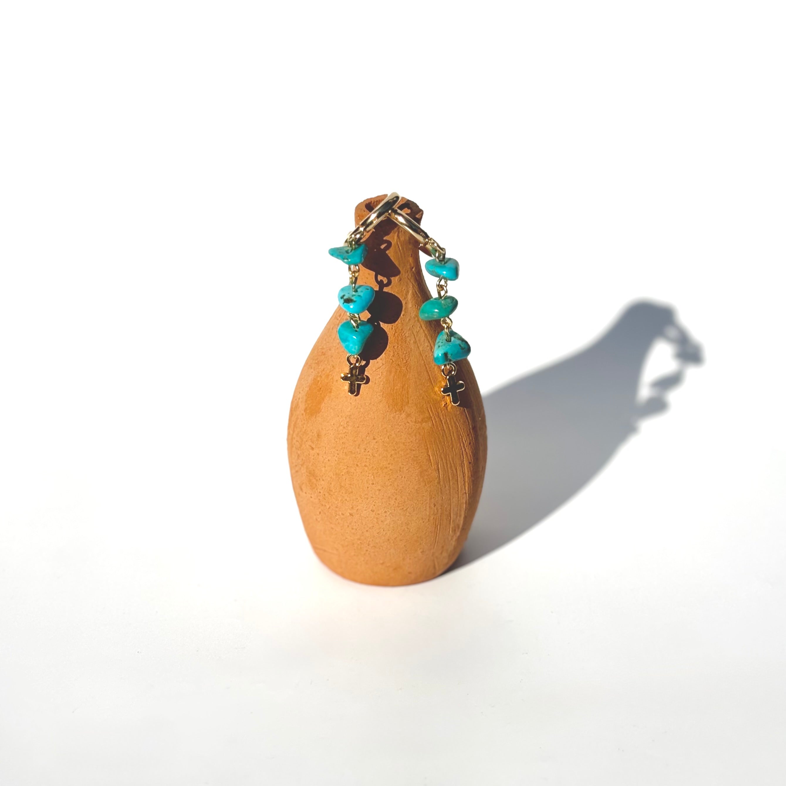 Turquoise Cross Clickers